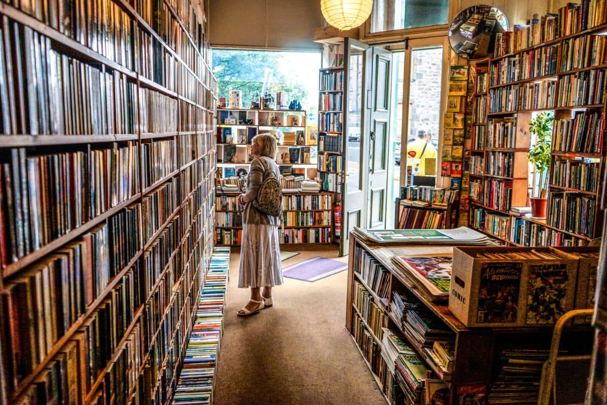 woman browsing books in a bookstore