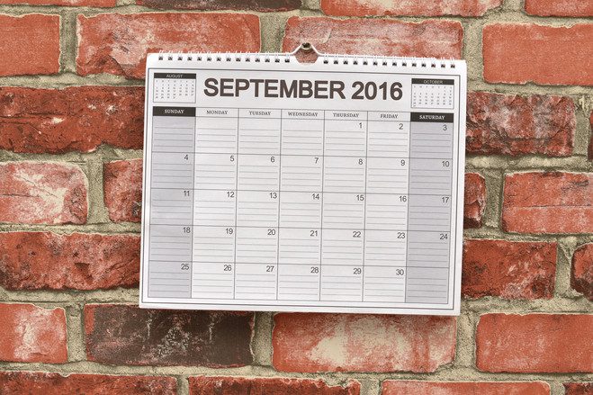 Calendar up on a wall with page turned to September