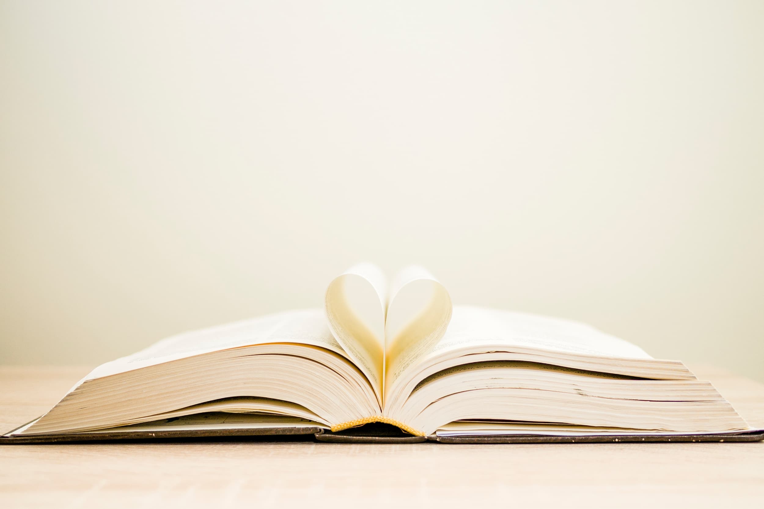 pages of book forming a heart