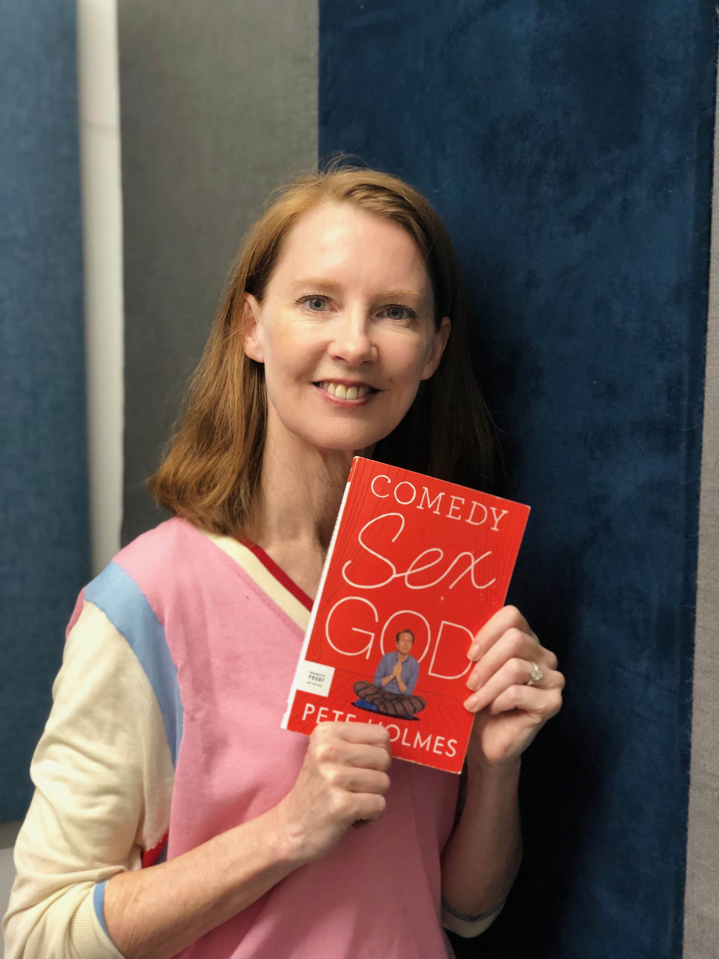 Gretchen with book Comedy Sex God by Pete Holmes memoir