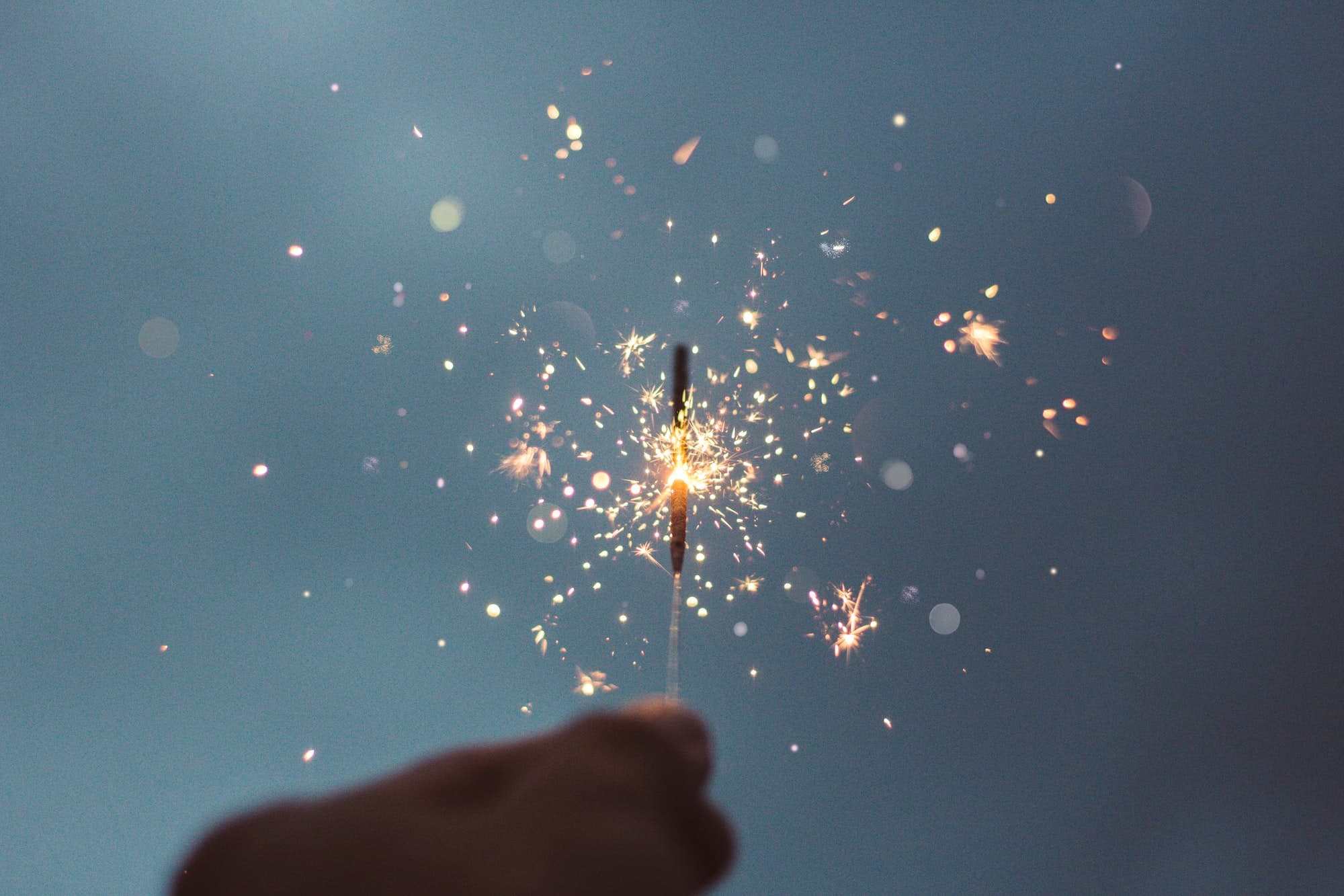 Person holding a sparkler