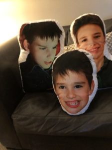 Personalized pillows of Liz's son Jack's face