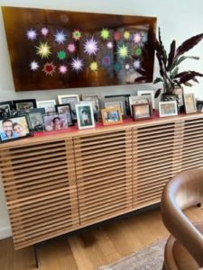 Elizabeth's sideboard with picture frames on top