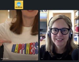 Photo of Gretchen wearing her "Happiness" T-shirt