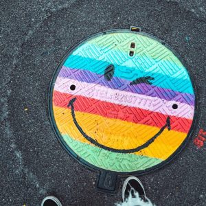 blue and yellow round logo